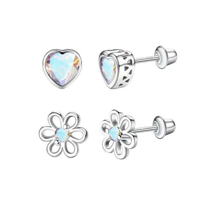 Pair of silver earrings with heart and flower designs on a white background
