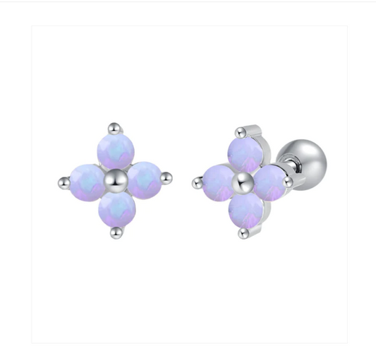 Flower earrings in surgical steel with opalescent white stones and screw backs for babies and first-time wearers.