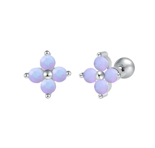 Baby earrings featuring opalescent white flower studs in surgical steel with secure screw backs.
