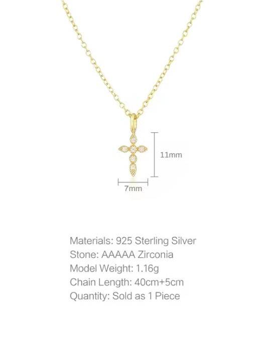 Cross necklace featuring 18k gold plated sterling silver and cubic zirconia, perfect for stylish elegance.