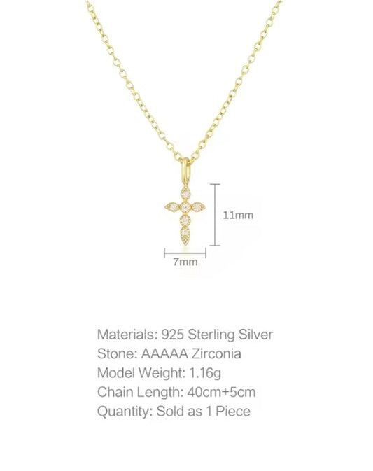 Cross necklace featuring 18k gold plated sterling silver and cubic zirconia, perfect for stylish elegance.
