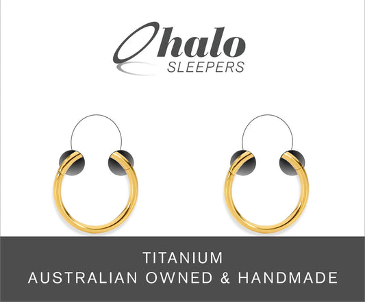 baby earrings by Halo Sleepers featuring yellow gold anodized G23 titanium polished hoop design.