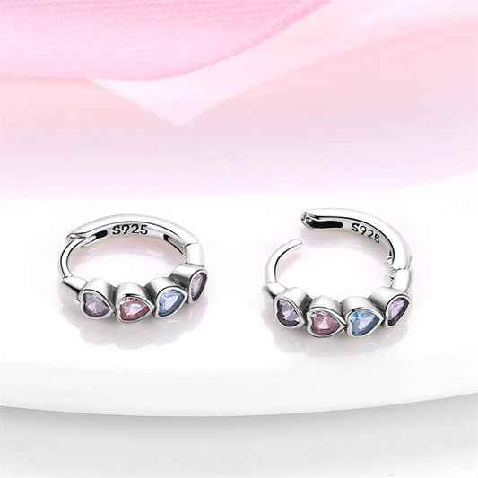 Heart hoop earrings in 925 sterling silver with pink, purple, and blue cubic zirconia stones.