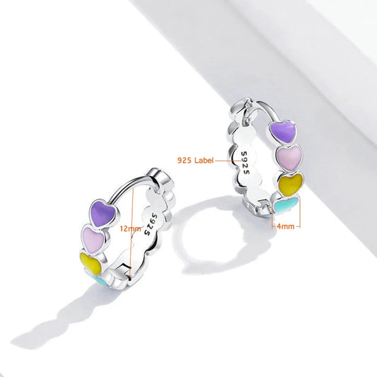 Heart hoop earrings in 925 sterling silver with rainbow enamel hearts, measuring 12mm and featuring a 925 label.