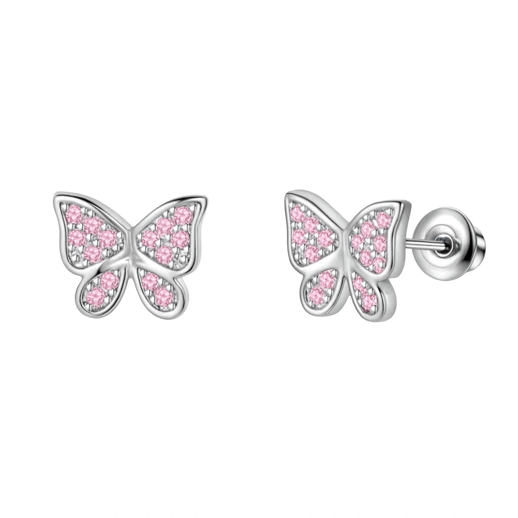 Butterfly-shaped earrings with pink gemstones on a white background