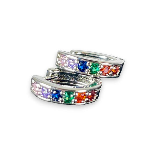 Pair of rainbow-colored hoop earrings on a white background