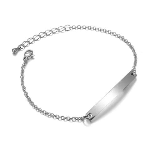 A highly polished surgical steel baby ID bracelet with an engravable name plate and lobster clasp.