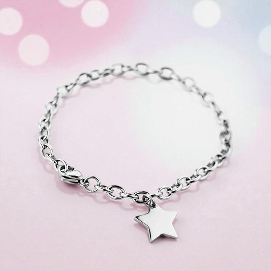 Elegant surgical steel children's bracelets featuring a charming star pendant on a polished chain.