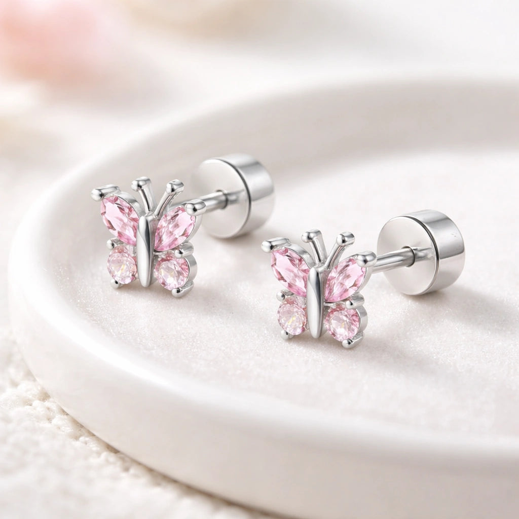 Children's earrings featuring pink CZ butterfly studs made from 316L surgical steel with screw-back fastenings.