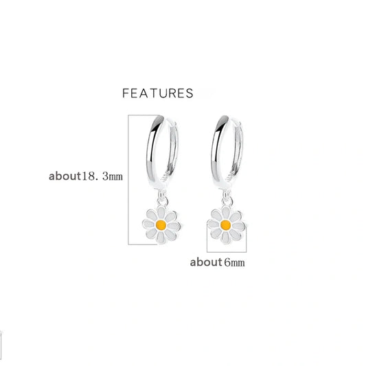 Daisy charm hoop earrings for girls with sterling silver and enamel features, measuring about 18.3mm and 6mm.