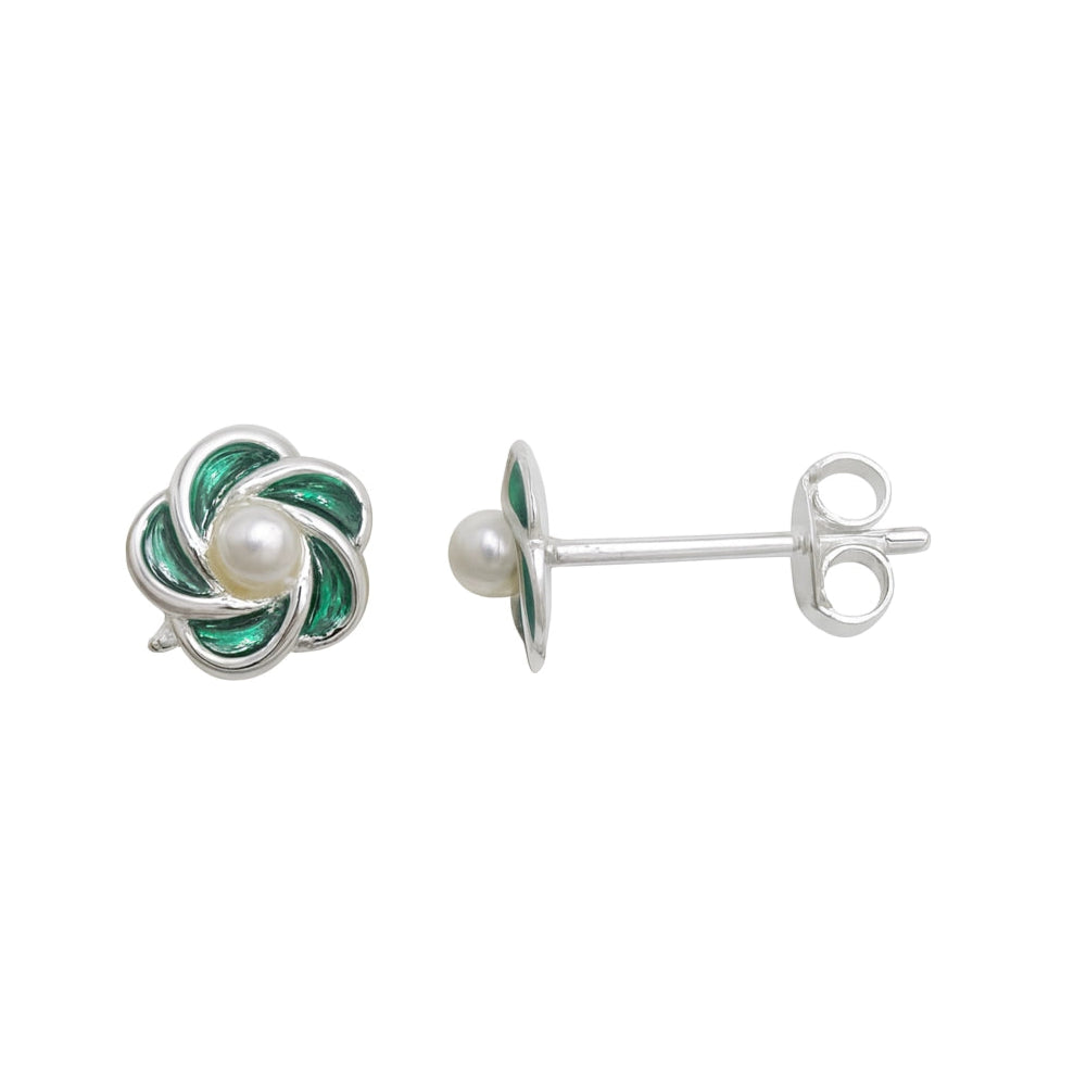 Silver earrings with green enamel and pearl on a white background