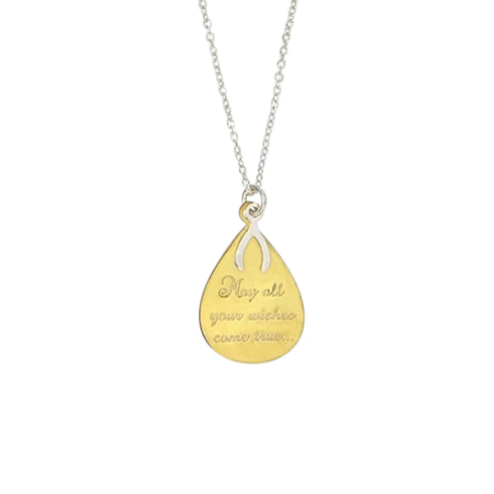 Children's necklaces featuring a 14k gold plated wishbone message pendant saying 'May all your wishes come true'.