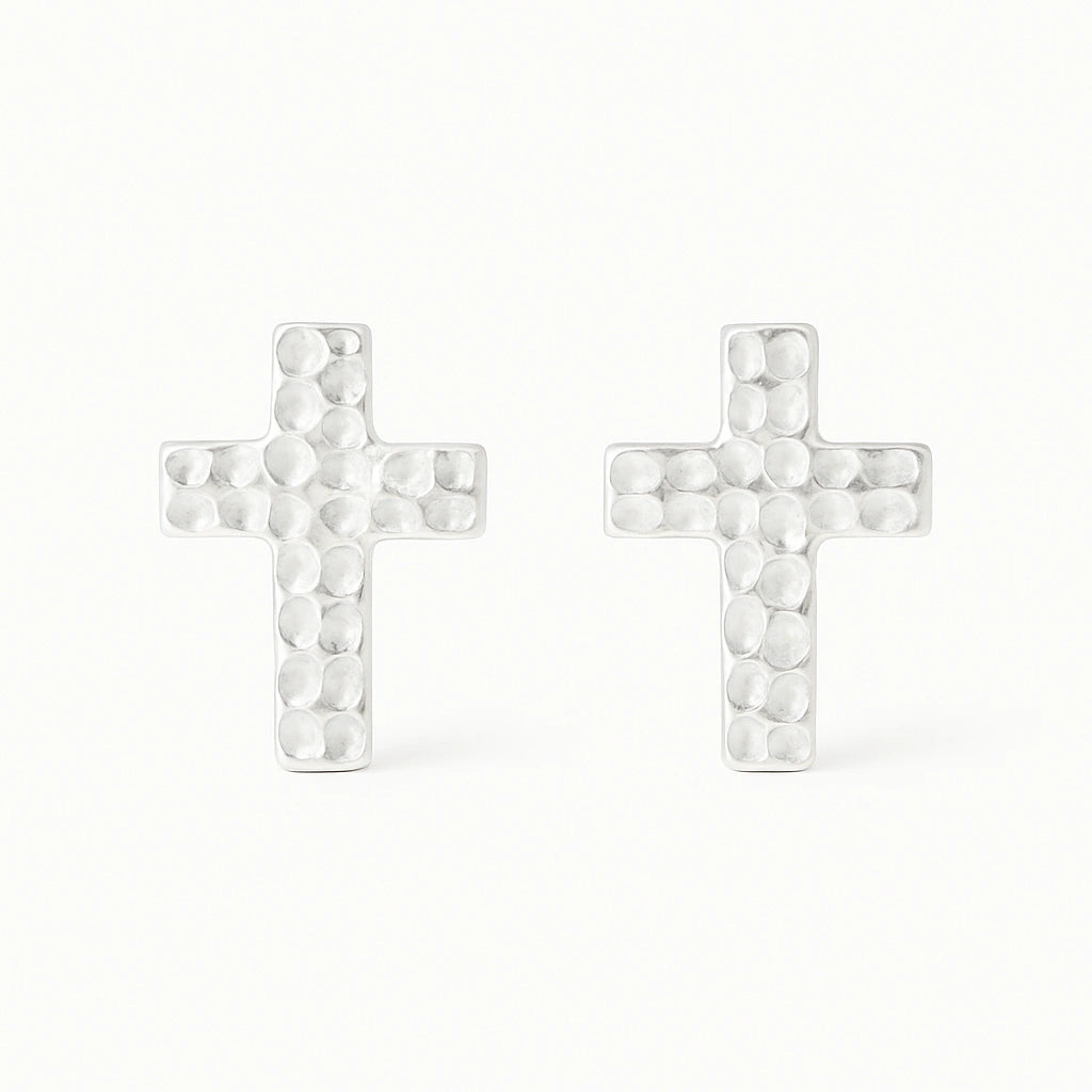 Cross-shaped earrings with a textured design on a white background