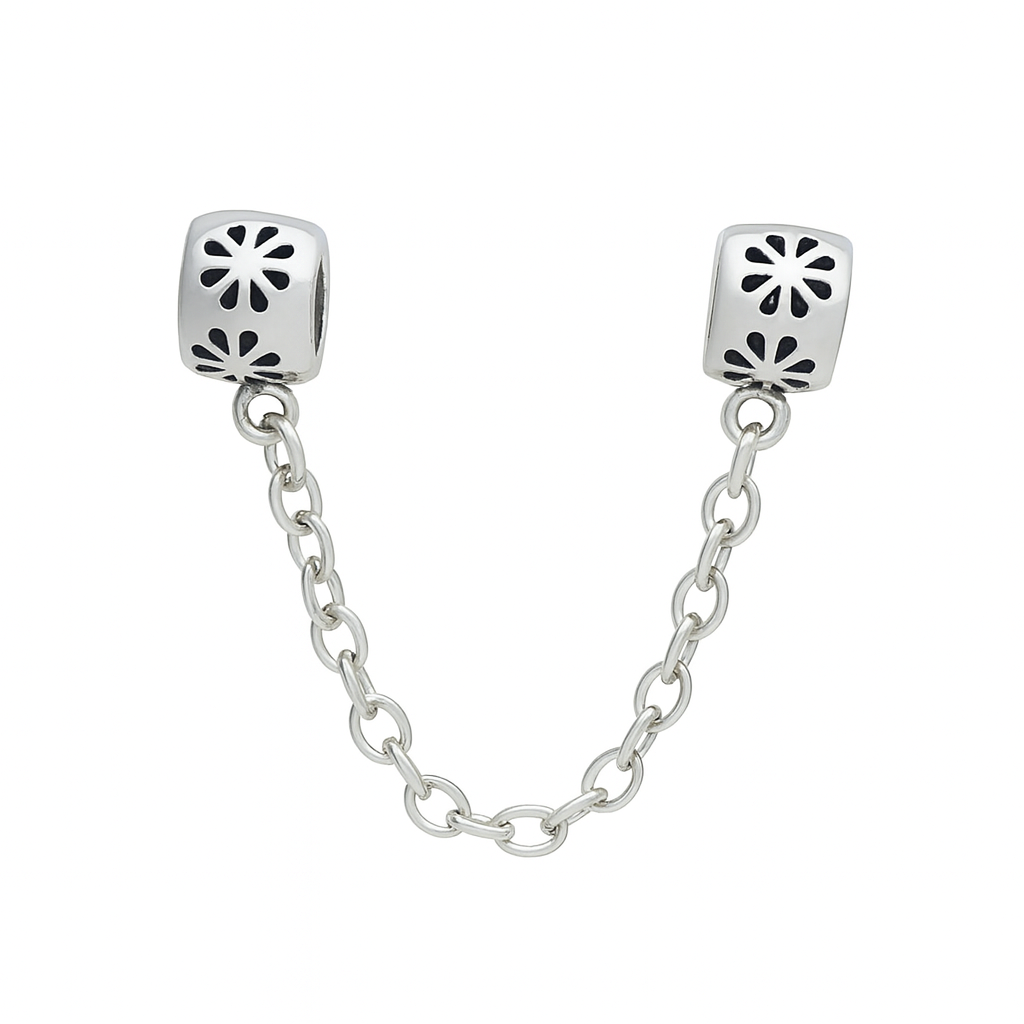 Silver chain with two square links featuring cut-out patterns on a white background