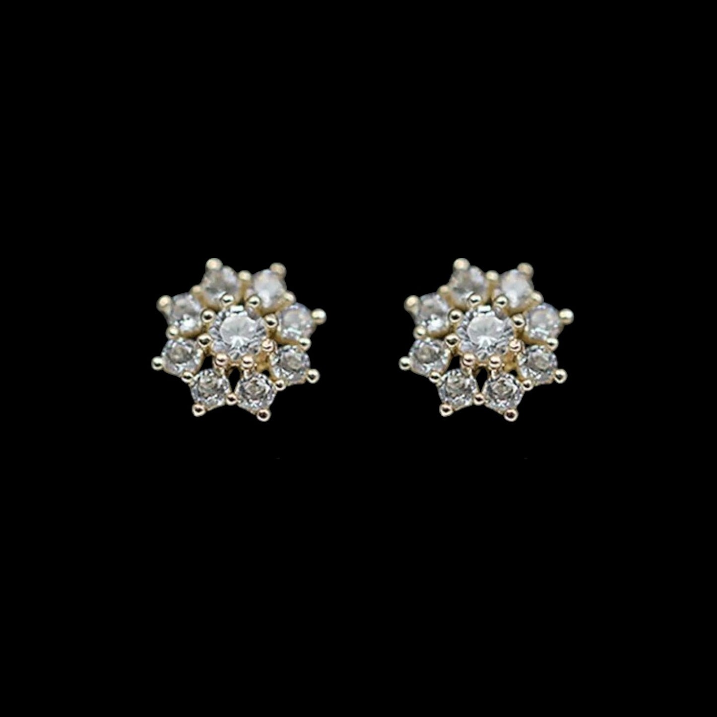 Pair of cubic zirconia stud earrings on a black background