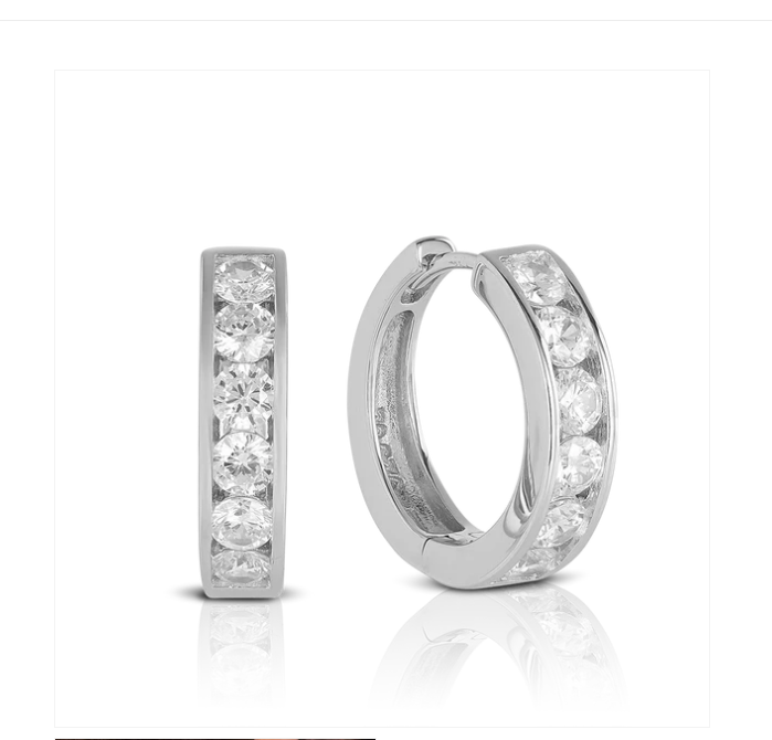 Clear CZ huggies featuring AAA clear cubic zirconia set in surgical steel, perfect for children's jewelry.