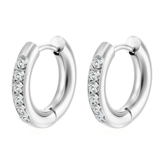 A pair of silver coloured hoop earrings with clear cubic zirconia accents.