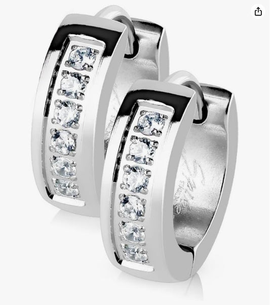 High‑resolution product photo of two polished sterling‑silver hinged snap hoop earrings, each featuring a channel of five round clear gemstones set in the front, displayed against a plain white background.