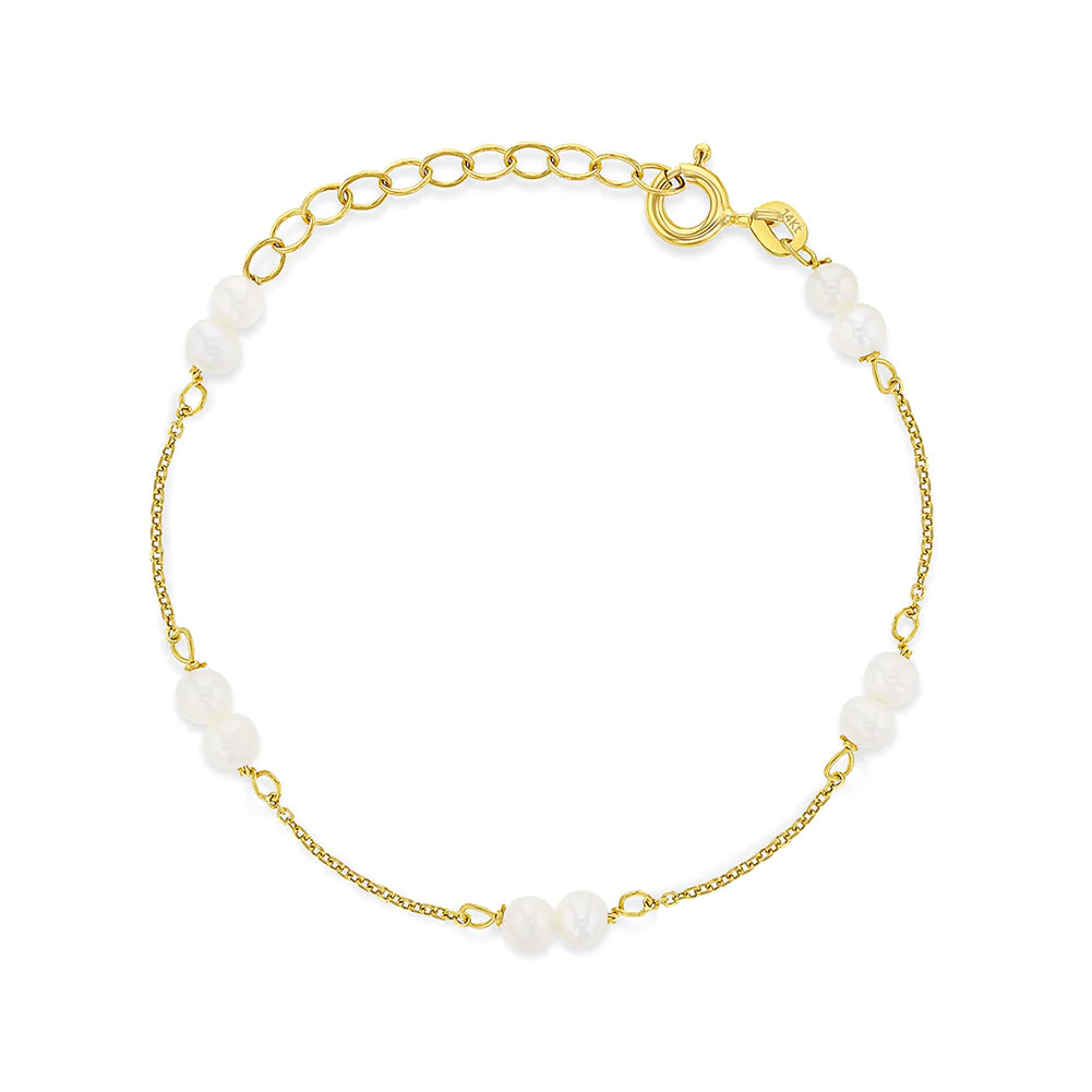 A 14k gold bracelet with white cultured freshwater pearls, featuring a chain-style design and a lobster clasp closure.
