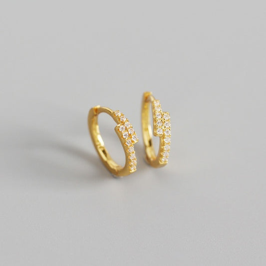 Children's Earrings: Sterling Silver Cross-Over CZ Huggie Hoops