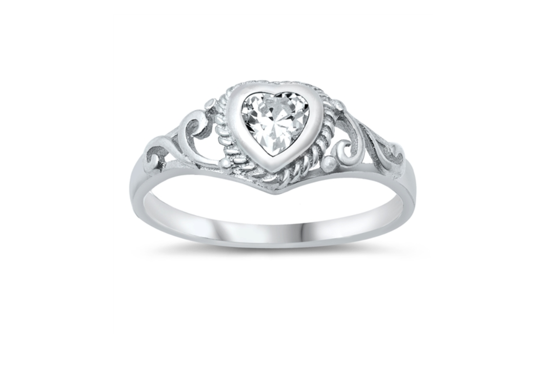 A sterling silver children's ring with a clear CZ heart set in a scroll setting, size 3.