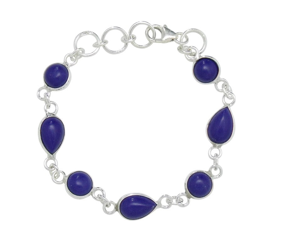 A sterling silver baby bracelet with deep blue Lapis stones, featuring a chain-link design and a lobster clasp closure.
