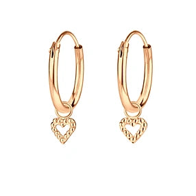 A pair of rose gold plated sterling silver sleeper earrings with open heart dangles.