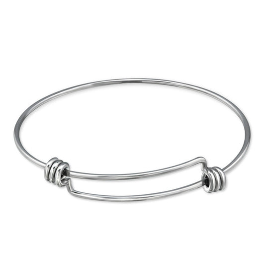An adjustable silver-coloured surgical steel charm bangle for children.