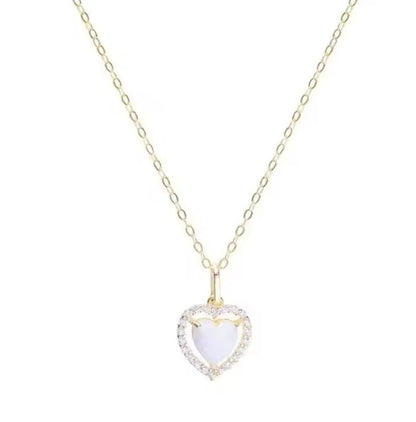 14k gold Plated heart halo necklace with a white fire opal heart pendant and clear CZ accents on a gold chain