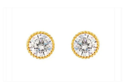 A pair of 14k gold crimped, bezel framed AAA CZ screw back earrings on a white background.