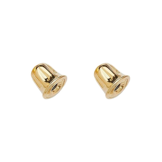 Two 14k gold screw back spares on a white background