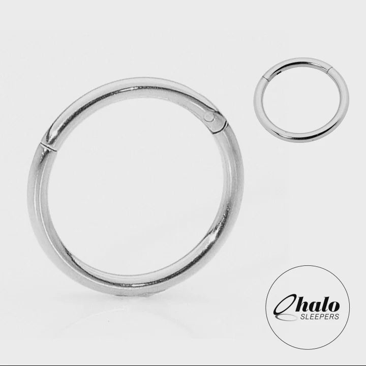 Children's earrings featuring G23 titanium polished hinged hoop design from Halo Sleepers in natural silvery grey.