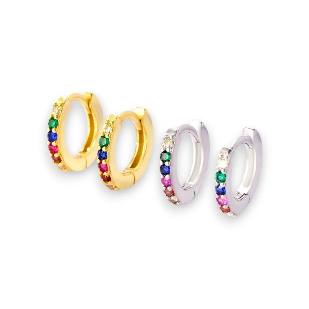 Baby hoop earrings featuring 925 sterling silver with rainbow CZ stones in huggie hoop design.