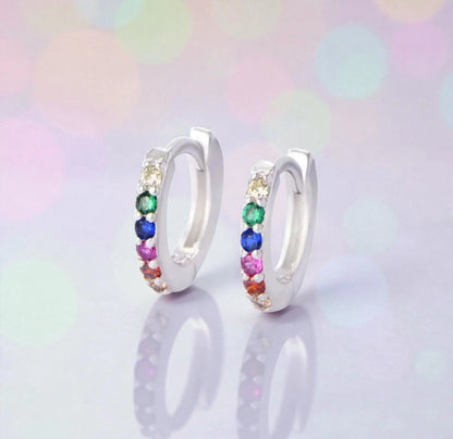 Baby hoop earrings made of 925 sterling silver with rainbow CZ stones, perfect for sensitive ears and everyday wear.