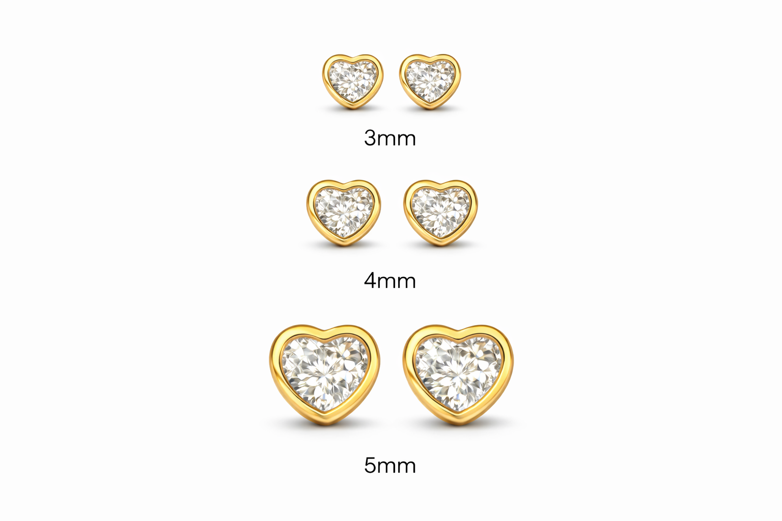 Children's earrings – Heart shaped cubic zirconia studs in 3mm, 4mm, and 5mm sizes with yellow gold bezel settings.