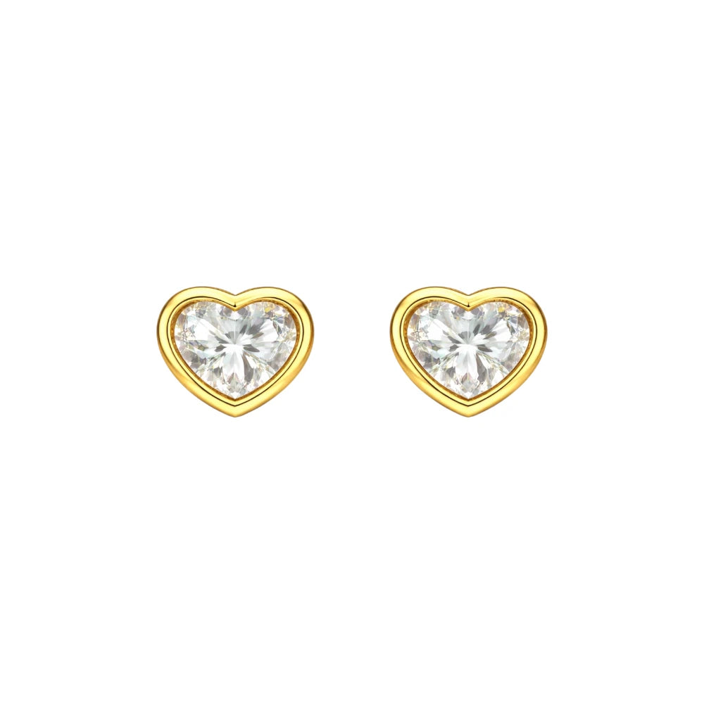 Children's earrings featuring 14k solid gold heart shaped bezel set cubic zirconia studs.