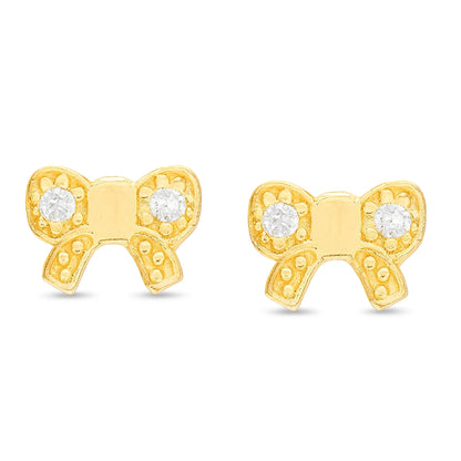 Bow earrings made of solid 14k yellow gold with clear cubic zirconia, perfect for children and elegant outfits.