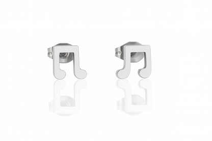 Pair of stainless steel musical note stud earrings on a plain white background with a subtle reflection beneath them.