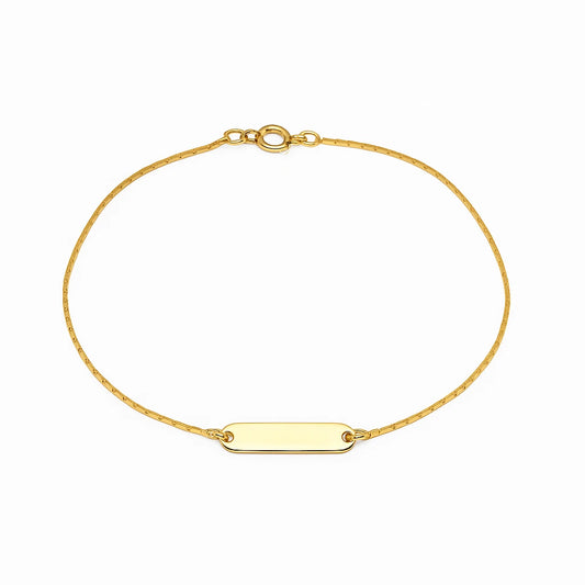 Children's anklet in gold plated ID style, featuring a fine chain and a rectangular ID plate.