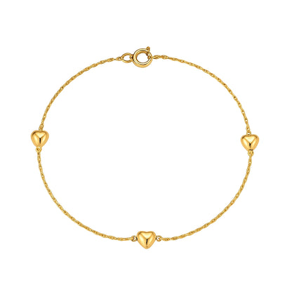 Children's anklet in gold plated metal featuring tiny gold hearts, perfect for kids' everyday wear and special occasions.