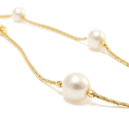 Children's anklet - gold plated chain featuring three lustrous white faux pearls.