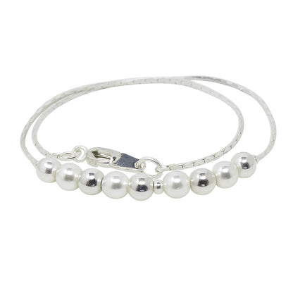 Children's anklet featuring silver plated chain with faux pearls and silver balls, 21cm long, perfect for kids.