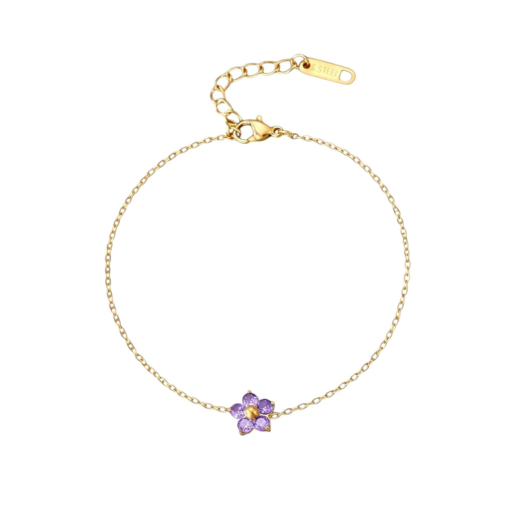 Children's bracelets featuring a purple CZ flower charm on an 18k gold plated adjustable chain.