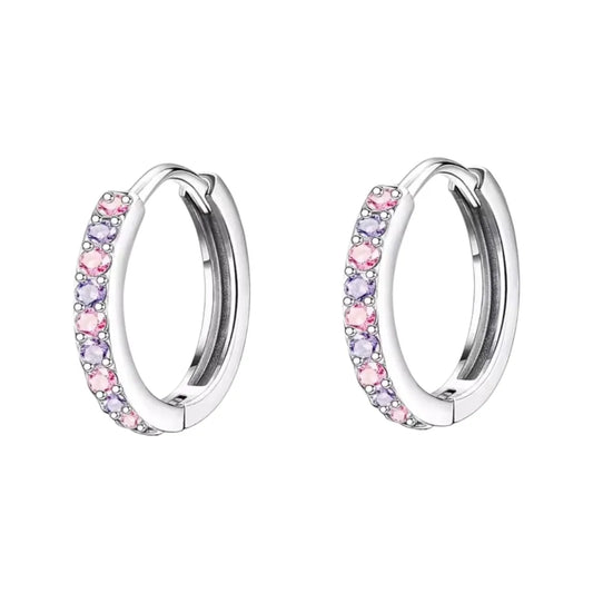 Children's earrings featuring pink and purple CZ stones in 316L surgical steel huggie hoops.