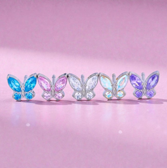 Children's earrings featuring colorful butterfly studs with blue, pink, and purple CZ crystals.