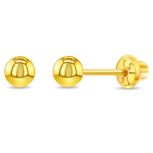 Gold baby earrings on a white background