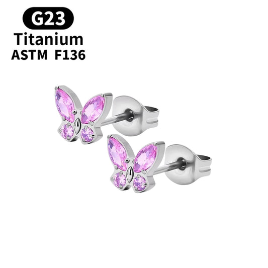 Children's earrings featuring pink CZ crystal butterfly studs made from G23 titanium.