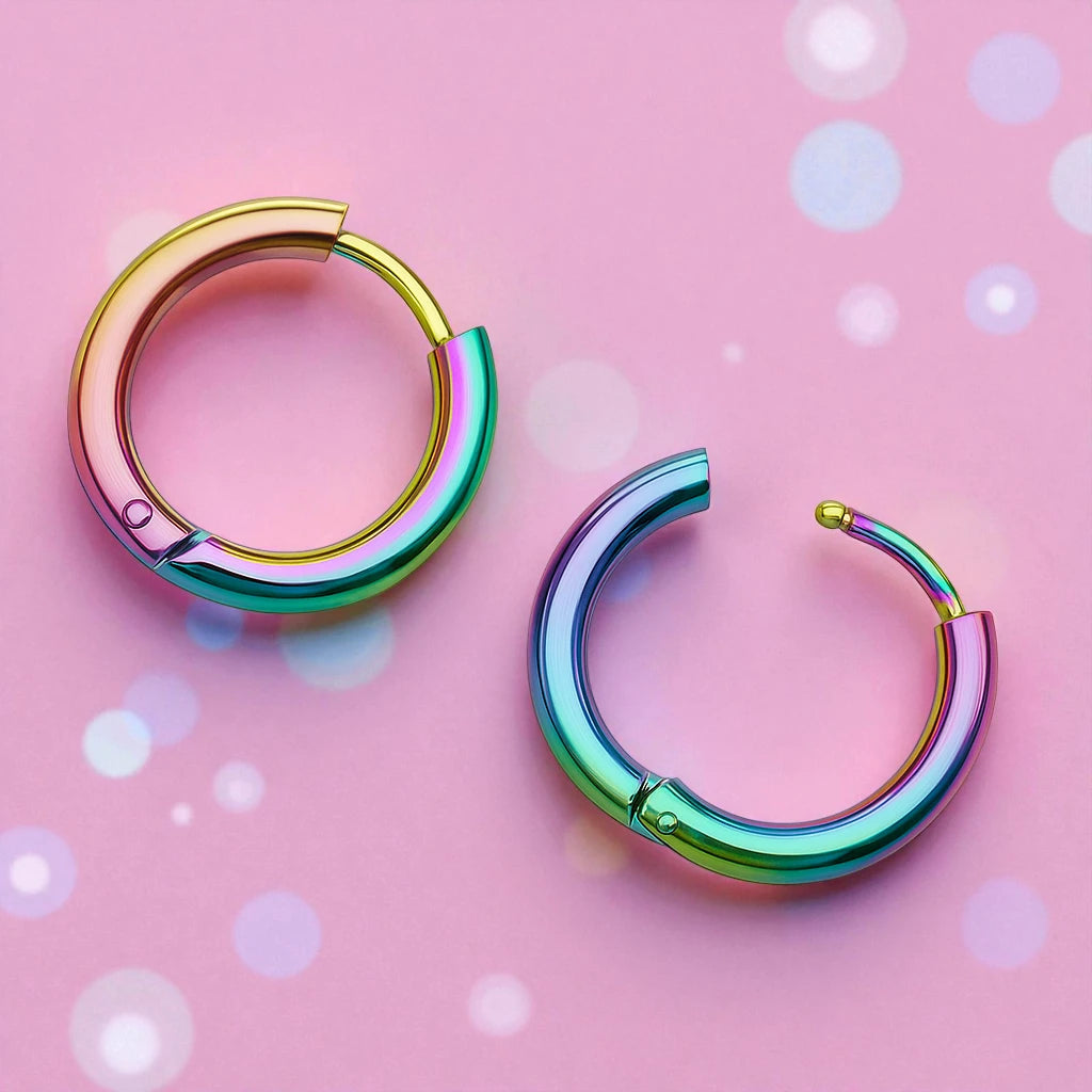 Children's surgical steel rainbow hoops - 10mm earrings in vibrant colors on a pastel background.