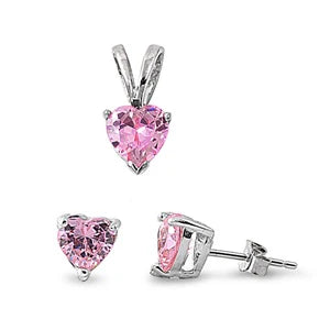 Children's jewellery sets including a pink CZ heart necklace and matching earrings in sterling silver.