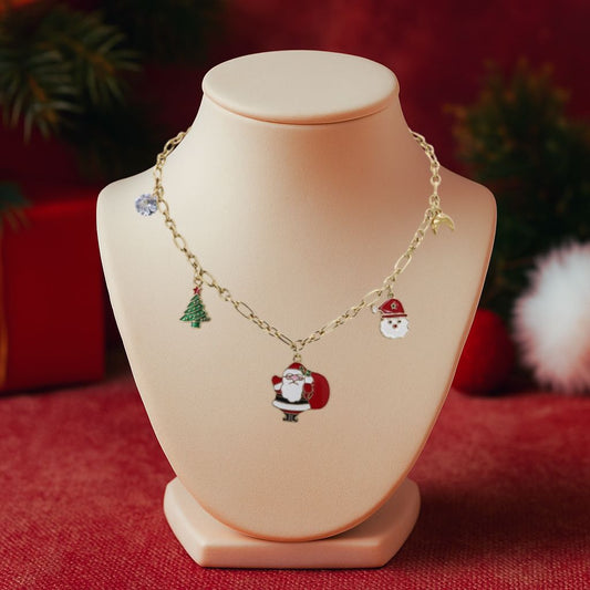 Christmas necklace featuring Santa Claus charm, colorful enamel, and elegant 18k gold plating on festive display.